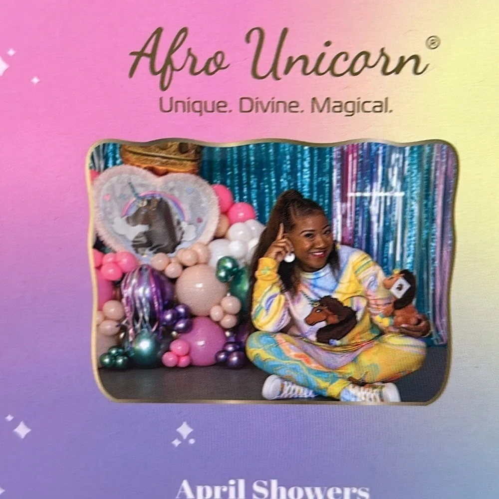 Afro unicorn toy and scrunchie set